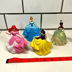 4 inch plastic Disney princesses, Cinderella, Snow, White, Tiana and Ariel